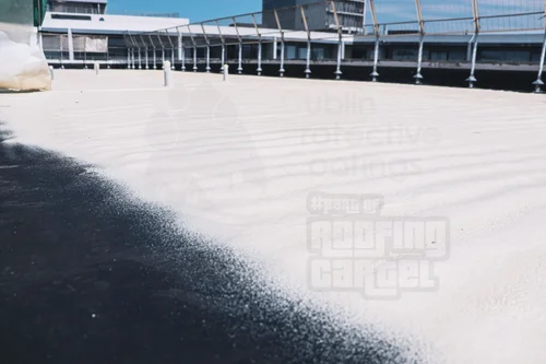 Spray foam insulation applied to roof before polyurea coating